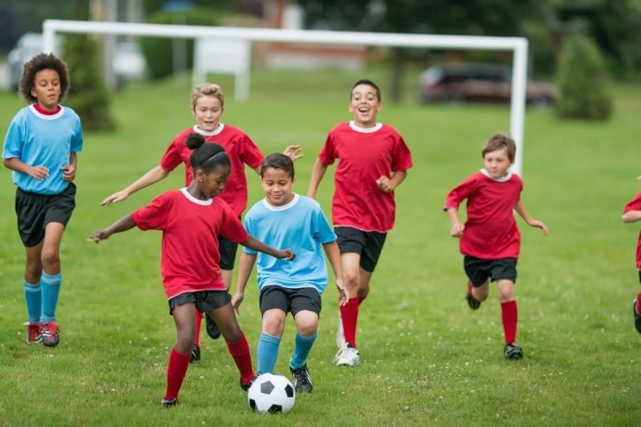 children playing soccer