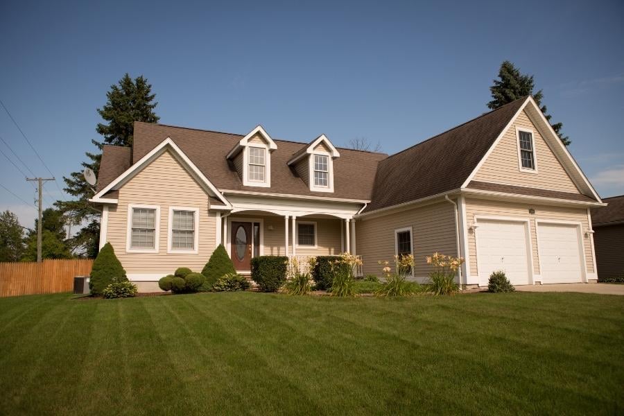 single-family home with green front yard