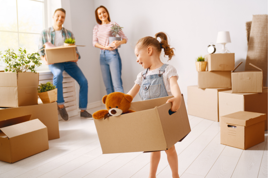 Military family moving into apartment and moving boxes