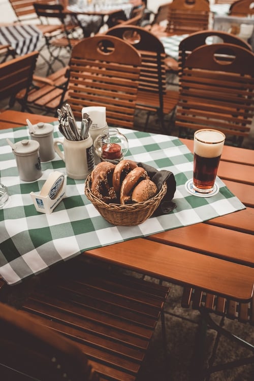 Munich biergarten with pretzels and German beer. 