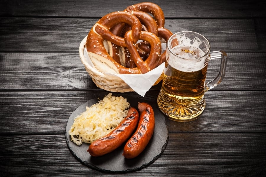 Typical German food of pretzels, beer, and bratwurst. 
