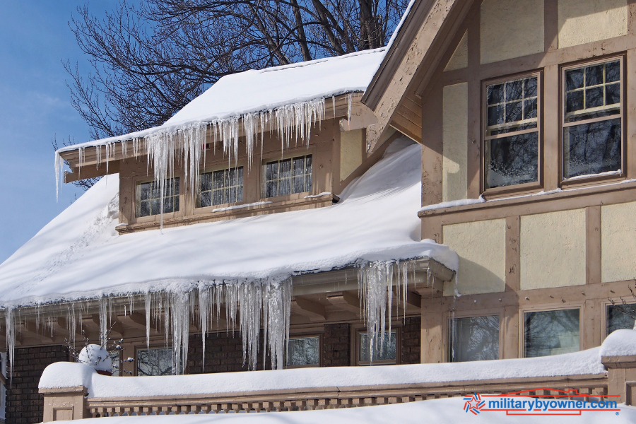 Home with icicles and snow