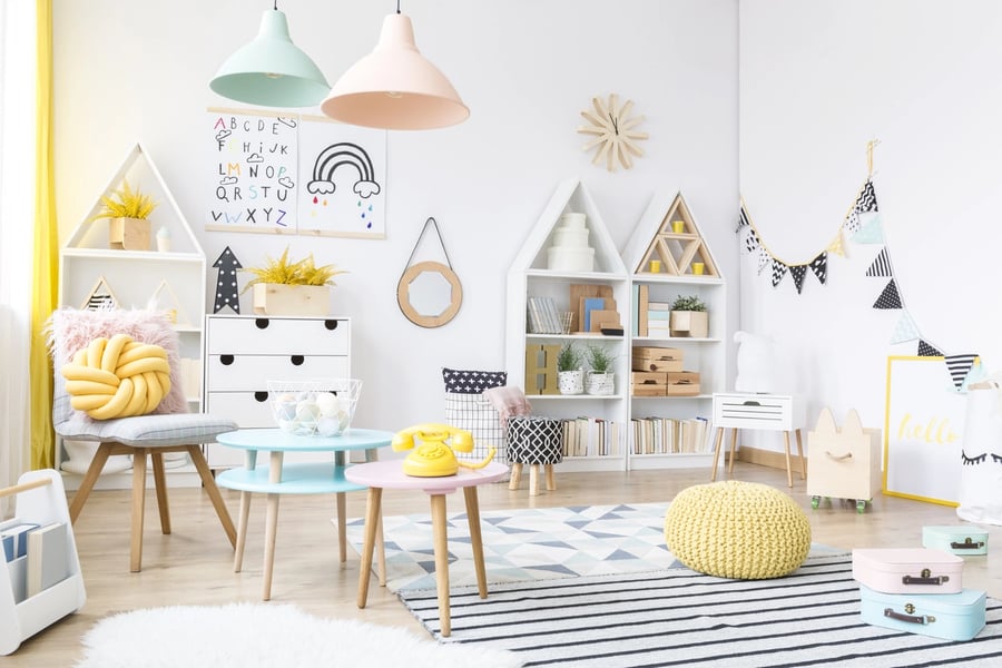 children's playroom with toys and furniture