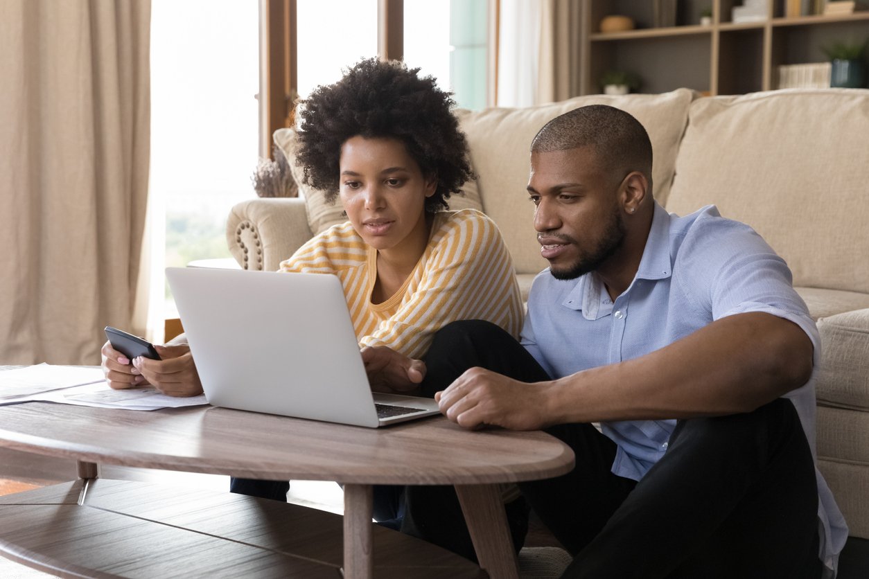 couple looking at laptop