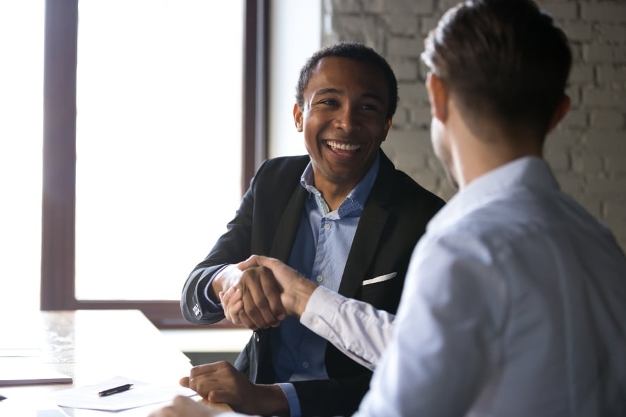 tenant and property manager shaking hands