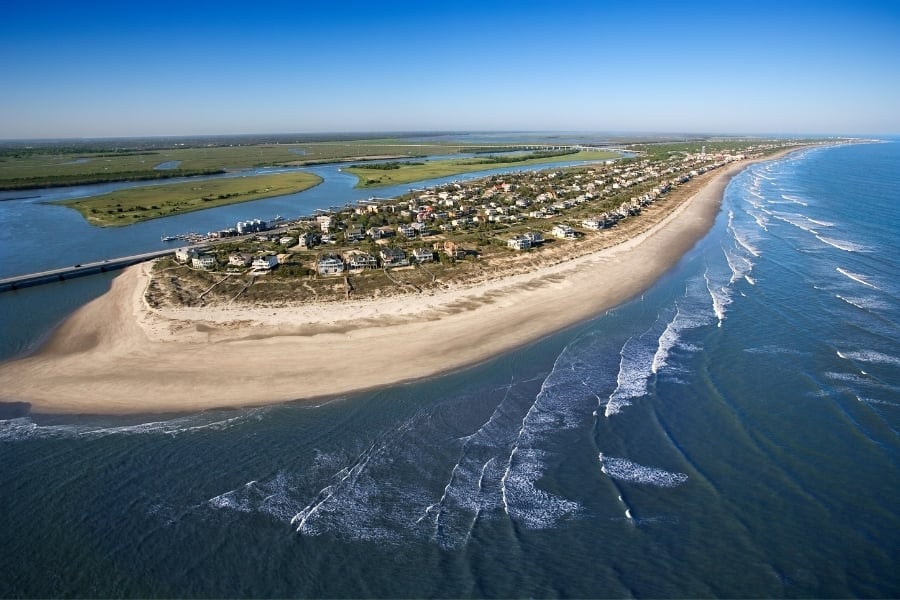 Aerial view of Isle of Palm in South Carolina with island, homes, ocean, and inlets