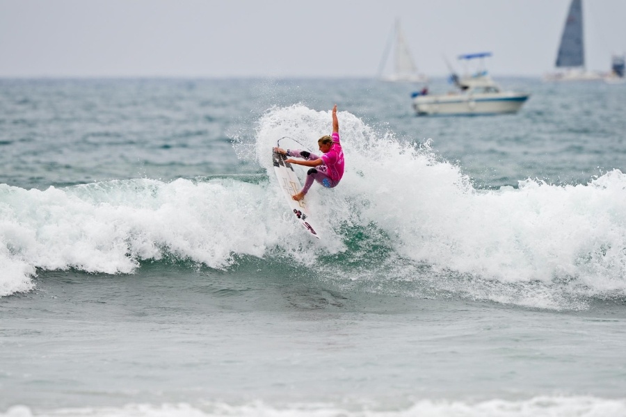 woman surfing near San Diego