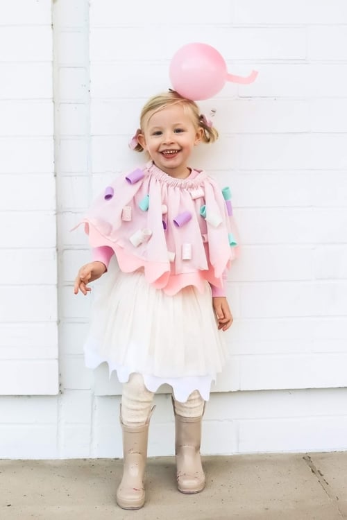 child dressed up as ice cream cone for Halloween