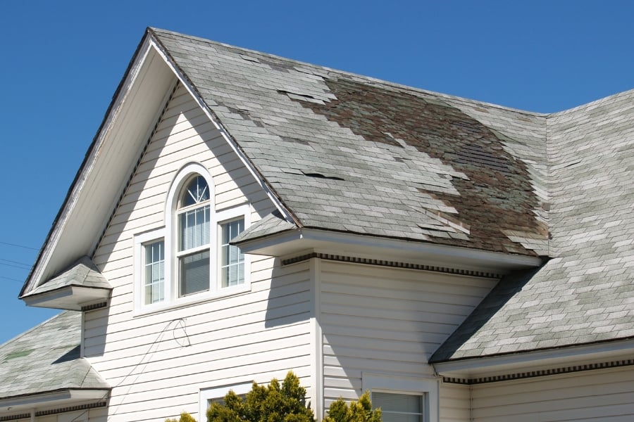 home's roof missing shingles
