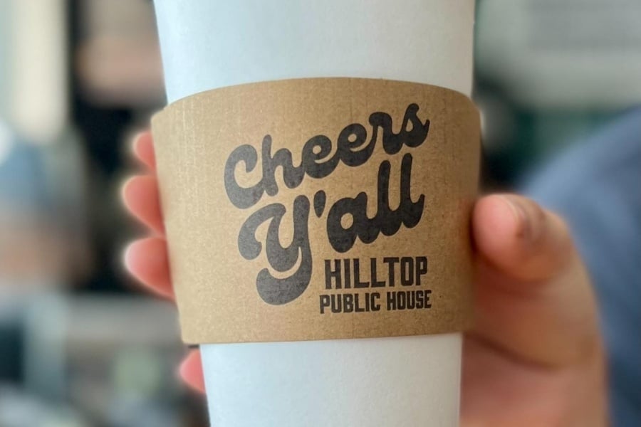 coffee cup with hilltop public house logo