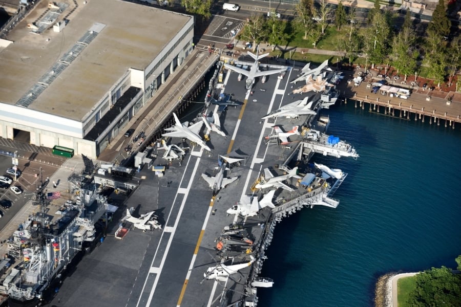Aerial view of the USS Midway ship and museum with it's aircraft on deck in San Diego, CA