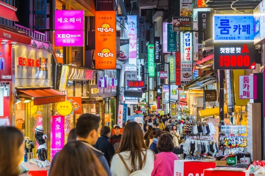 Crowded marketplace at night in Seoul, South Korea