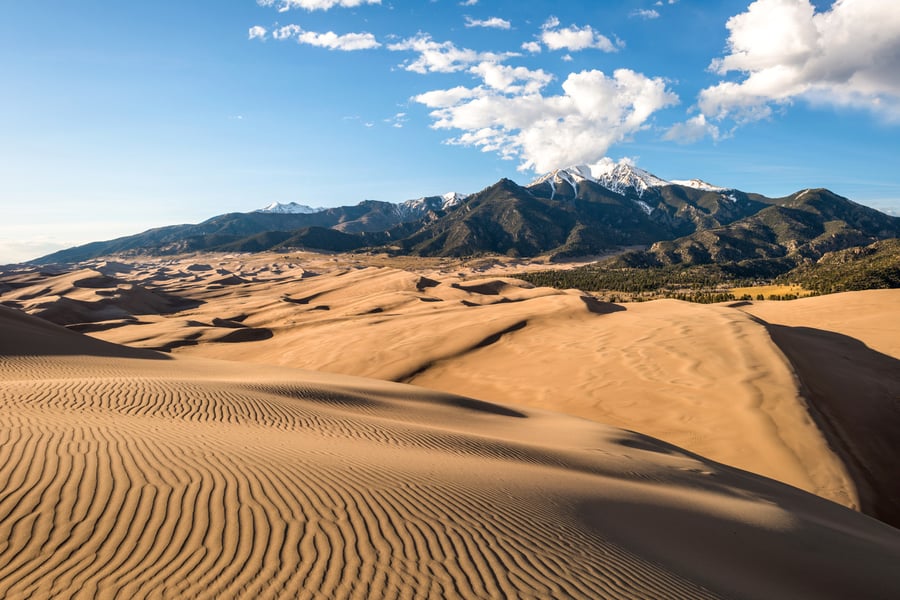 Sunset view of sand waves at the top of Great Sand Dunes, Great Sand Dunes National Park & Preserve, Colorado, USA.