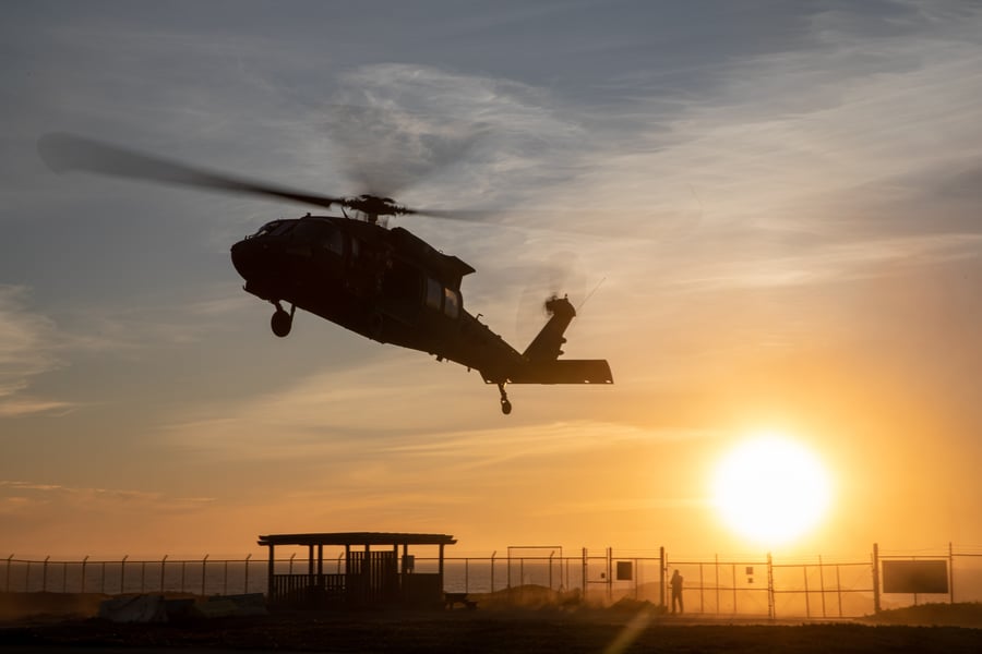 U.S. Army Soldiers assigned to 2nd Battalion, 158th Aviation Regiment, 16th Combat Aviation Brigade land a UH-60 Blackhawk during a maritime operation with Naval Special Warfare operators, Dec. 4, 2023. Naval Special Warfare is the nation's elite maritime special operations force, uniquely positioned to extend the Fleet's reach and gain and maintain access for the joint force in competition and conflict. (U.S. Army photo by Spc. Joshua Linfoot)