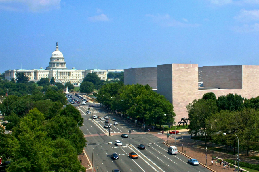 DC road with Capitol Hill in background