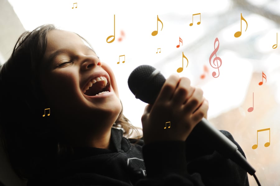 young girl singing karaoke