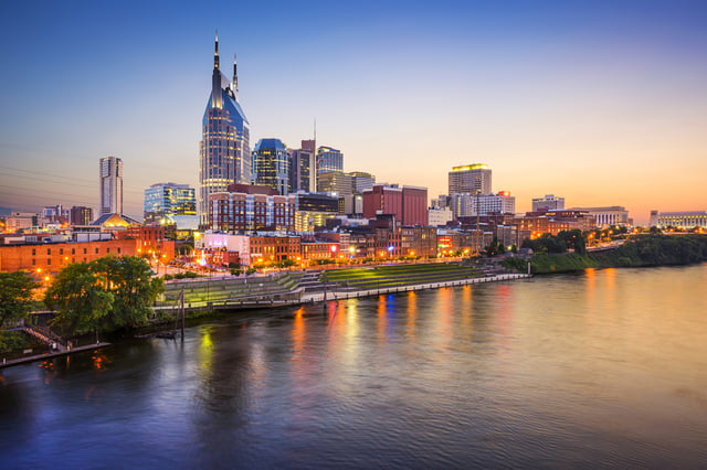 Nashville, Tennessee, USA downtown skyline on the Cumberland River.