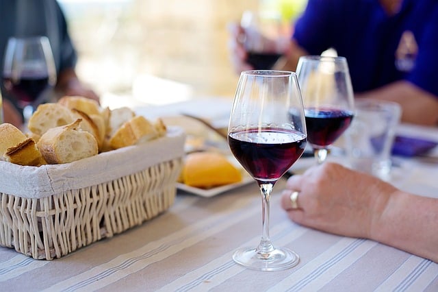 bread in basket and glass of wine