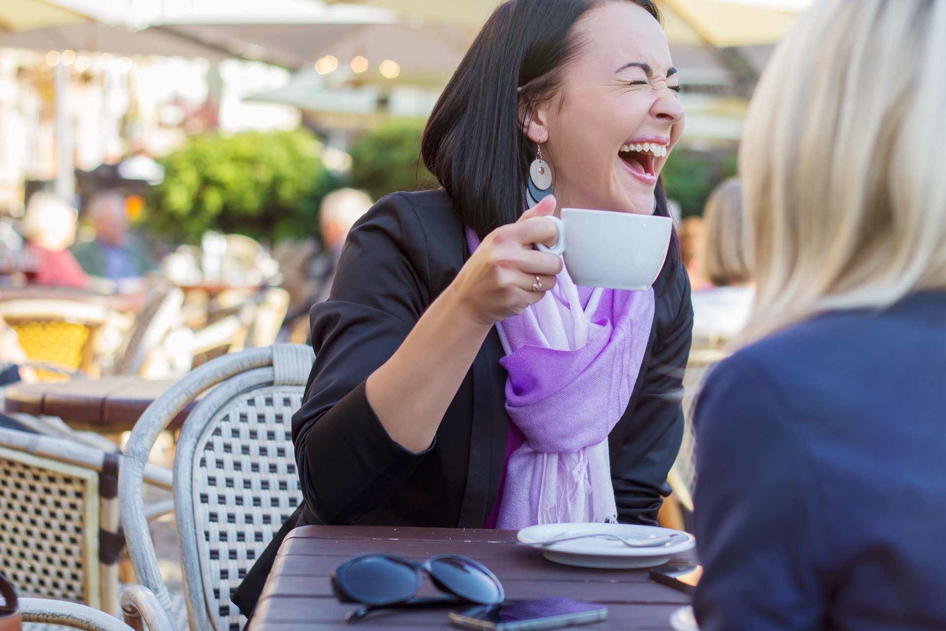 Having a good effect. Women laughing Airport. Eva Lifestyle.