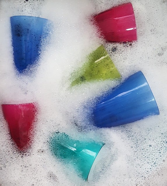 dishes in soapy water