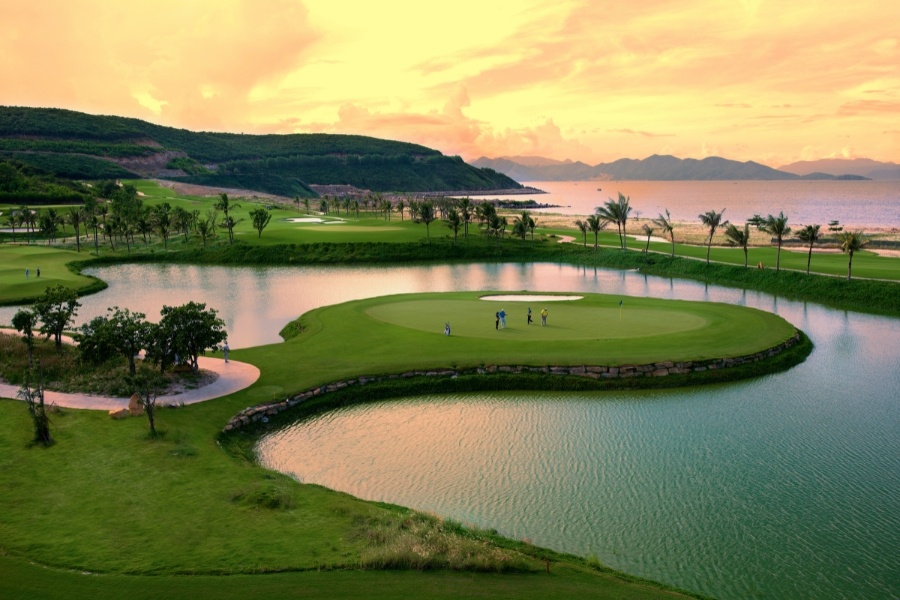 golf course on island with palm trees