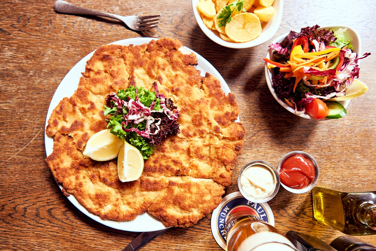 schnitzel salad and beer