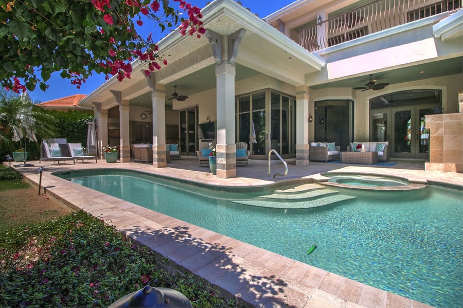 real estate photo of backyard and pool