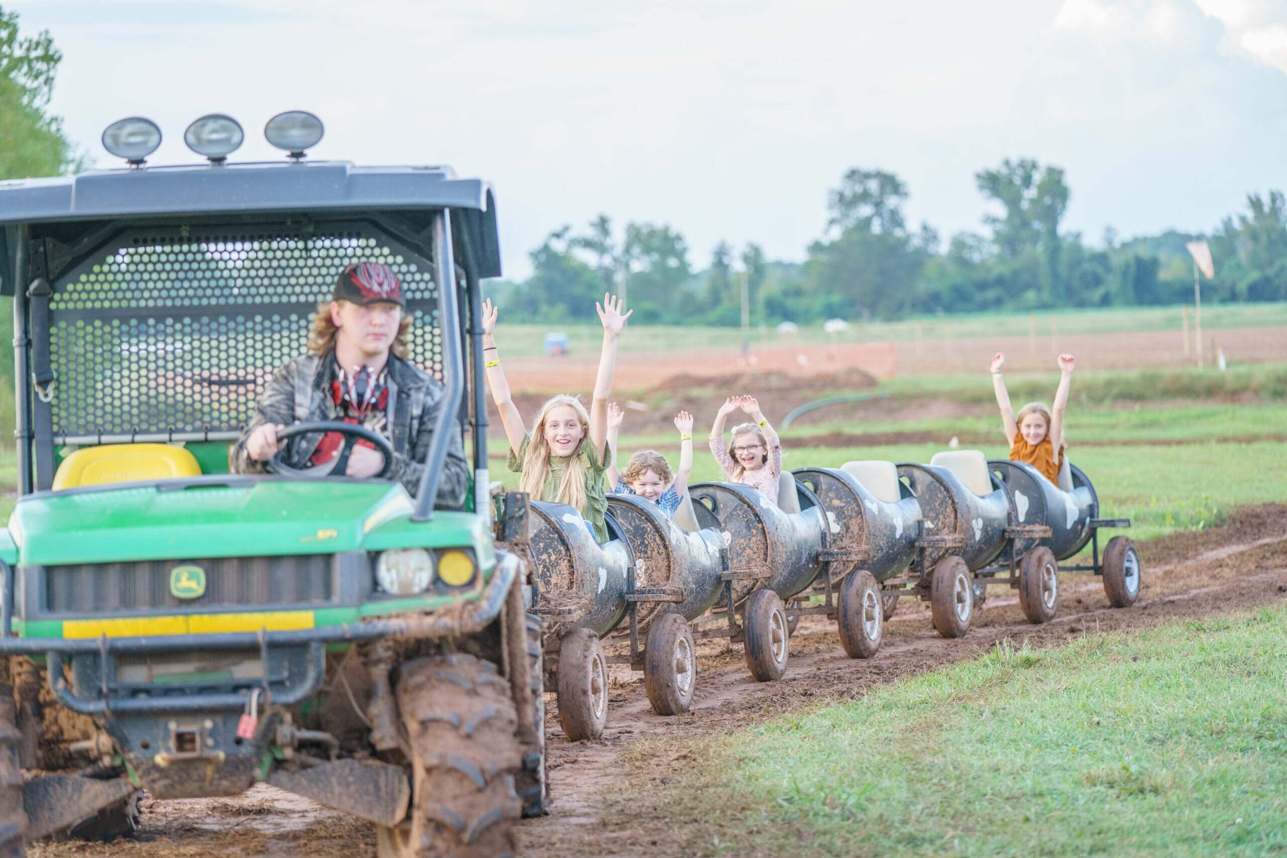 tractor ride with children at Dixie Maze Farms