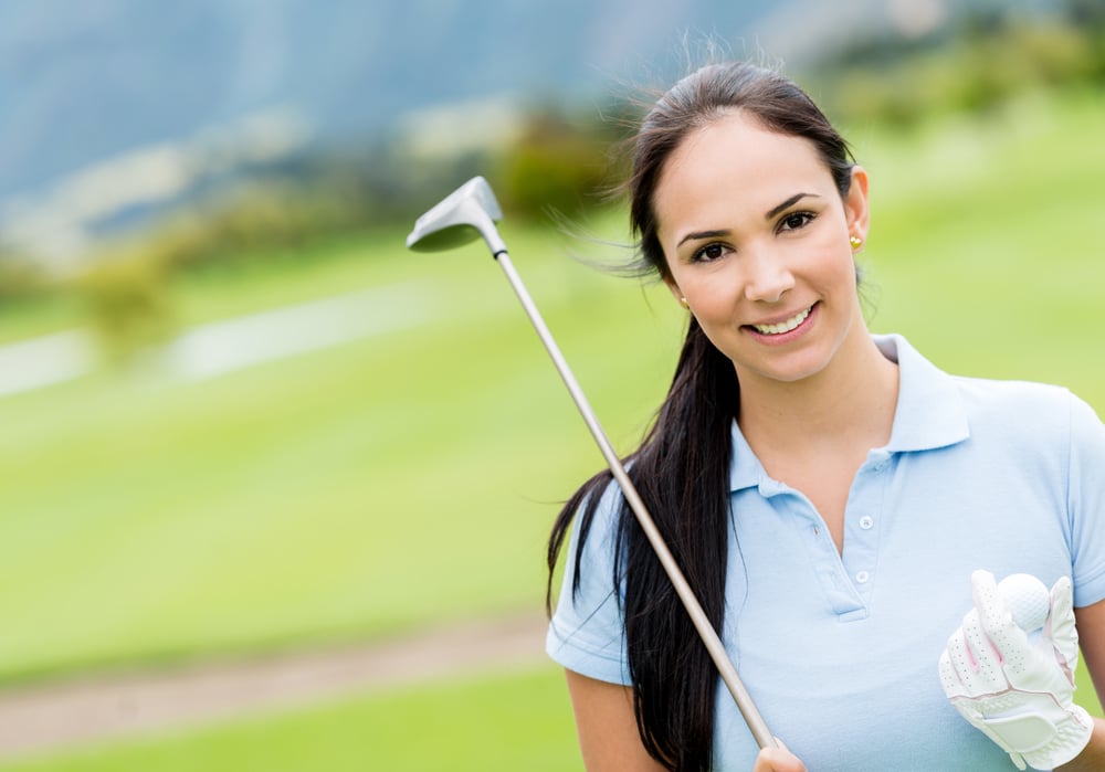 Female golf player at the course