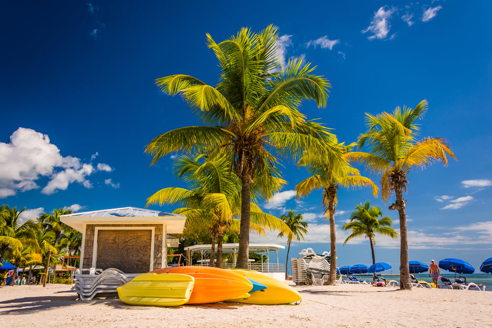 Vacation home and palm trees on the beach in Key West, Florida.