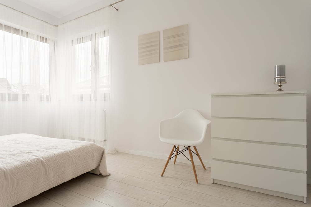 Simple exclusive white bedroom with wooden parquet-1