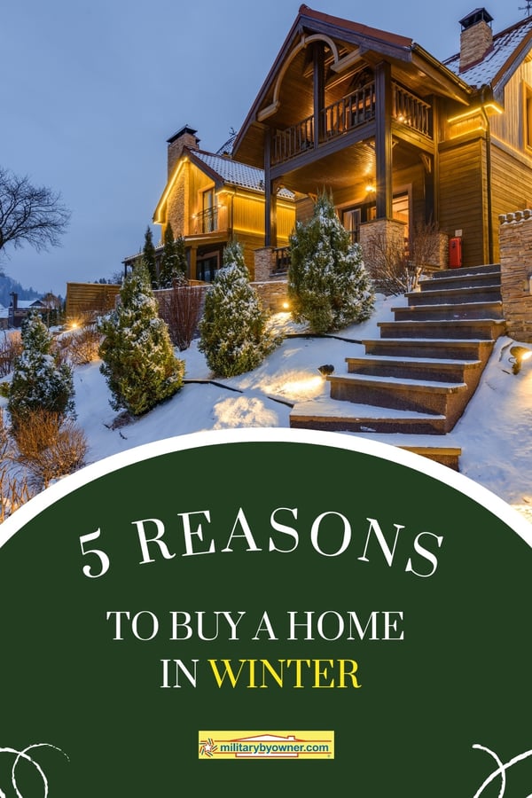 Photo of lit walkway through snowy ground and shrubs to wooden illuminated house with text 5 Reasons to Buy a Home in Winter