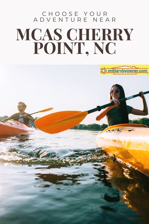 Man and woman kayaking in yellow and orange kayaks with text, Choose Your Adventure Near MCAS Cherry Point