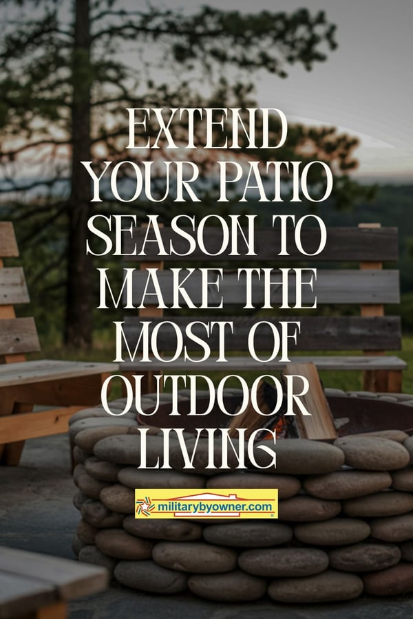River stone fire pit on patio with wooden chair around it and tall trees in background with text, Extend Your Patio Season to Make the Most of Outdoor Living