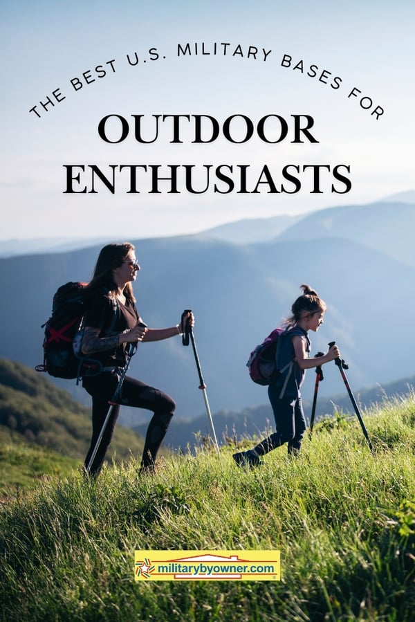 Mom and daughter hiking on grassy mountain with text, The Best U.S. Military Bases for Outdoor Enthusiasts