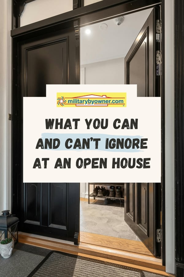 One black door of double-door entrance is open to entryway where you can see gray tile and wooden flooring with shoe rack against the wall and text, What You Can and Can't Ignore at an Open House