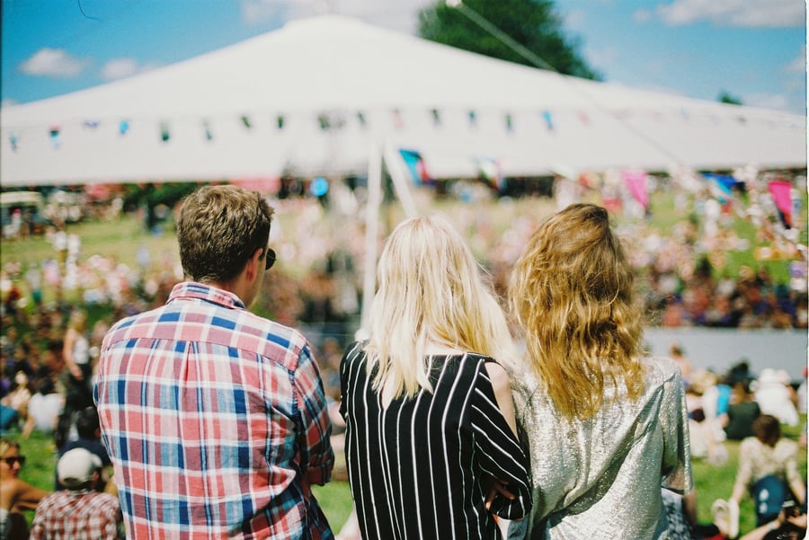 Friends at an outdoor festival. 