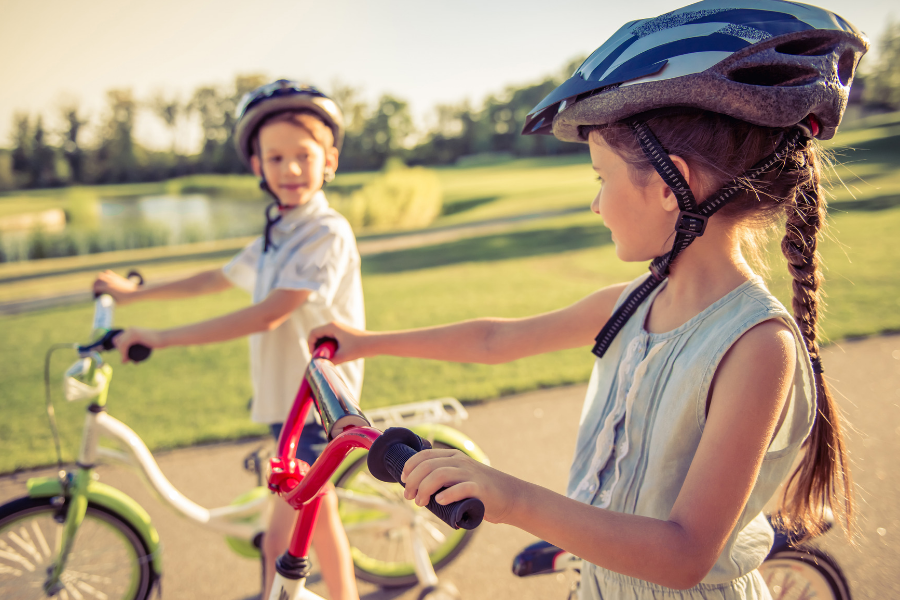 kids riding bikes base housing