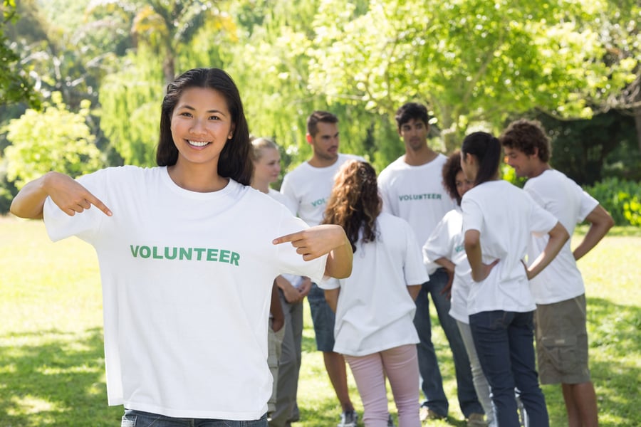 woman in volunteer shirt