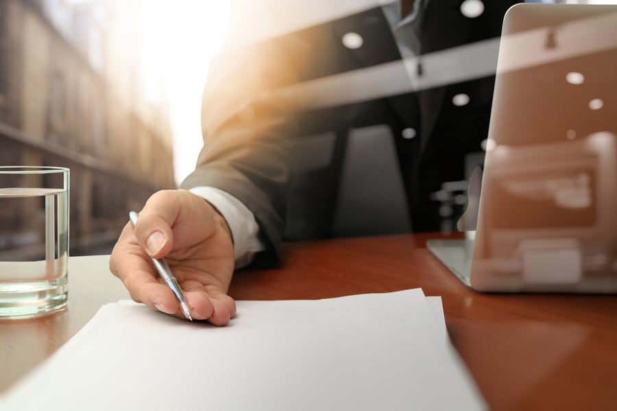 double exposure of businessman or salesman handing over a contract on wooden desk-1