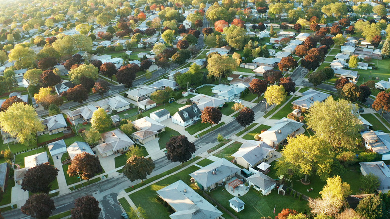 American suburban neighborhood with trees in autumn
