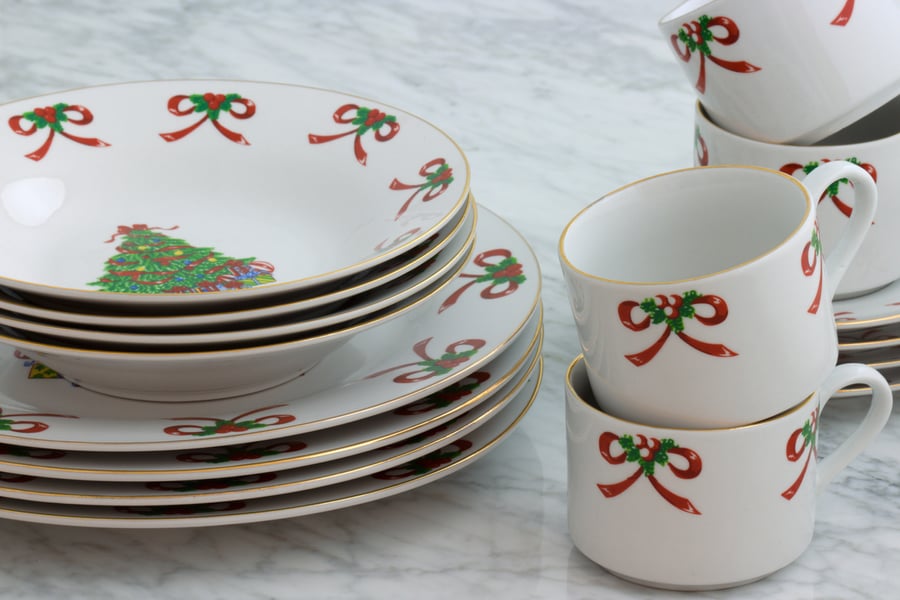 dishes and cups decorated with holiday pattern