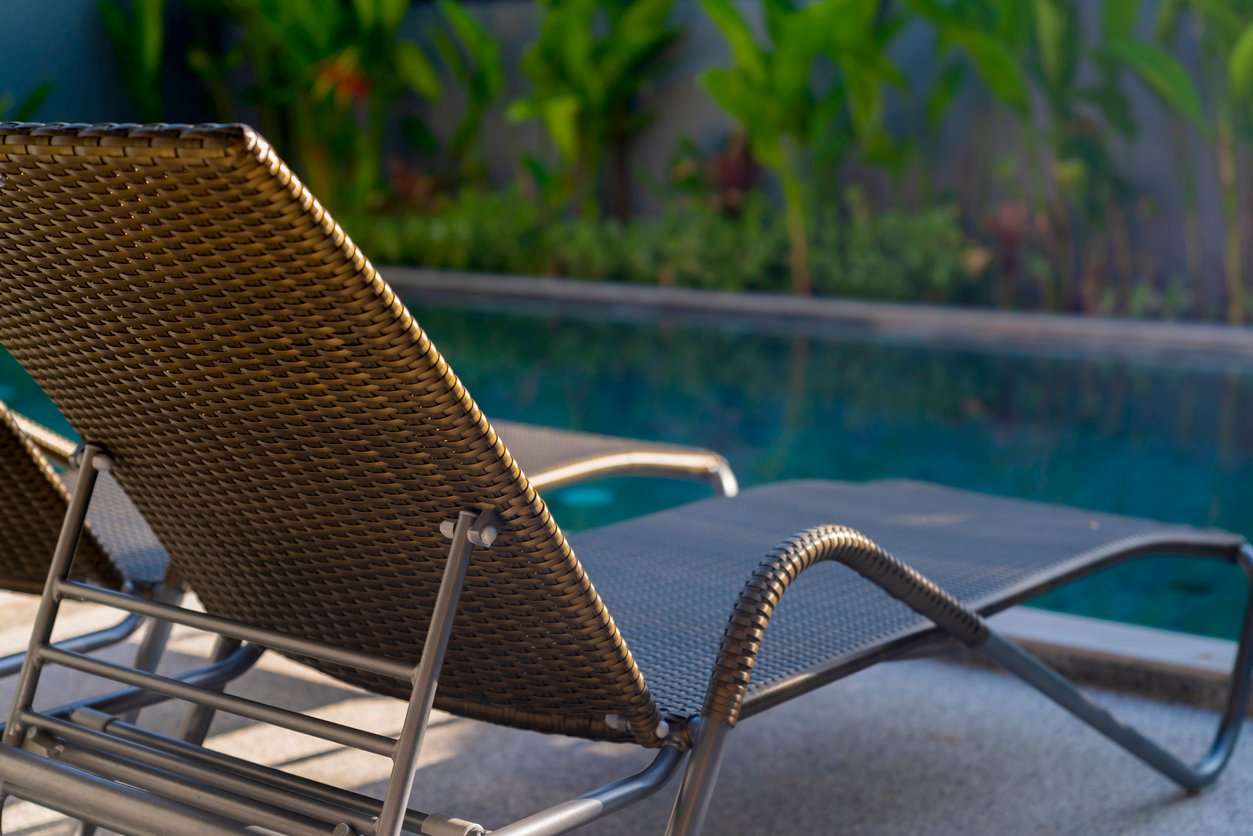 lounge chairs by pool