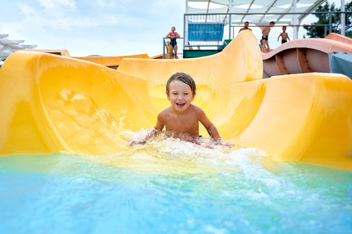 young child on waterslide