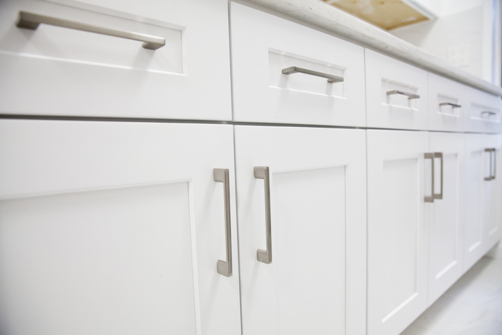 white kitchen cabinets with hardware
