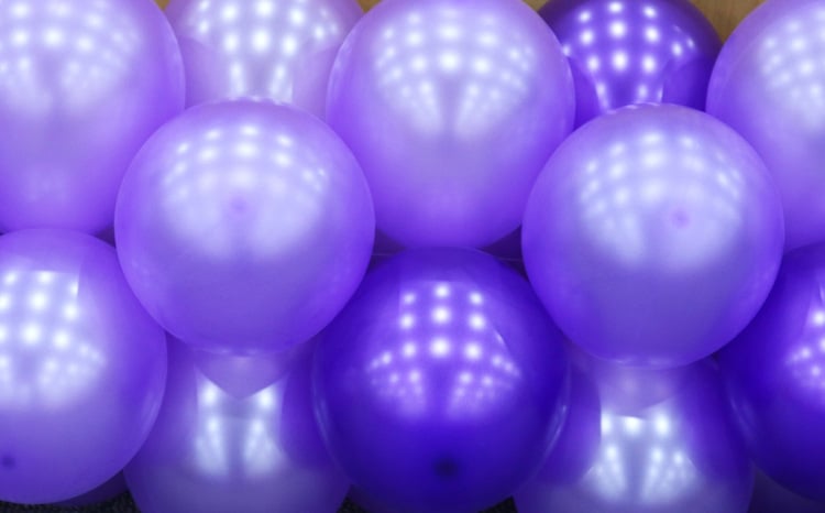 bunch of purple balloons