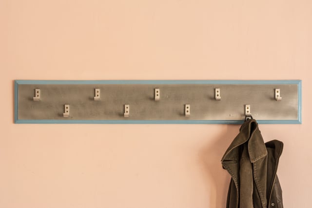 Use hooks and shelving to create more storage space in your garage. 