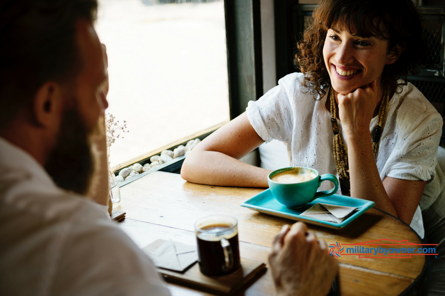 couple having dinner over a table with coffee